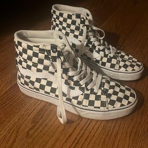Black and white checkered high top vans